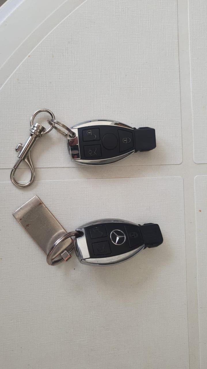 Two Mercedes-Benz smart keys after new shells were fitted